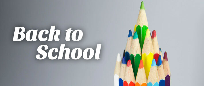 Back to School. Colored pencils gathered together form the shape of a pyramid.