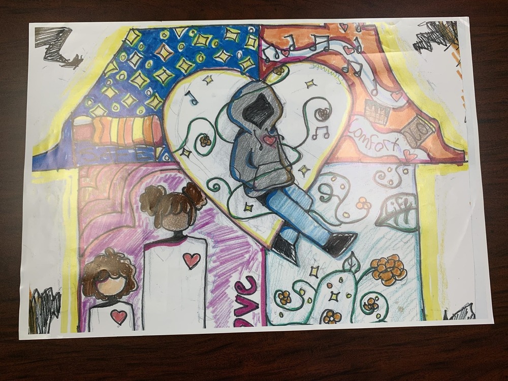 A drawing of a house and a person in a hoodie listening to music.